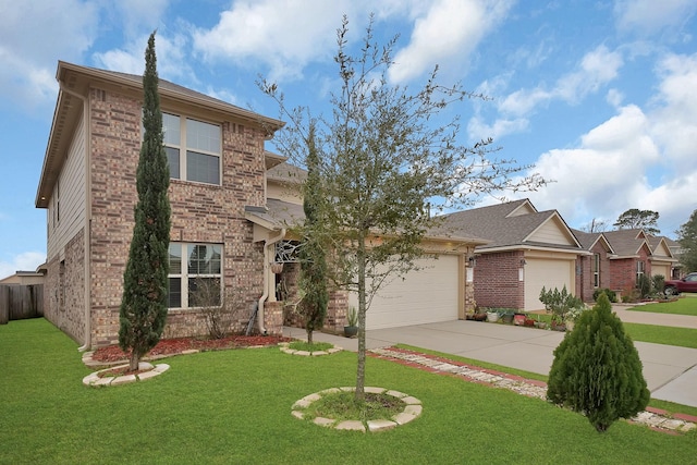 view of front of home with a garage and a front yard