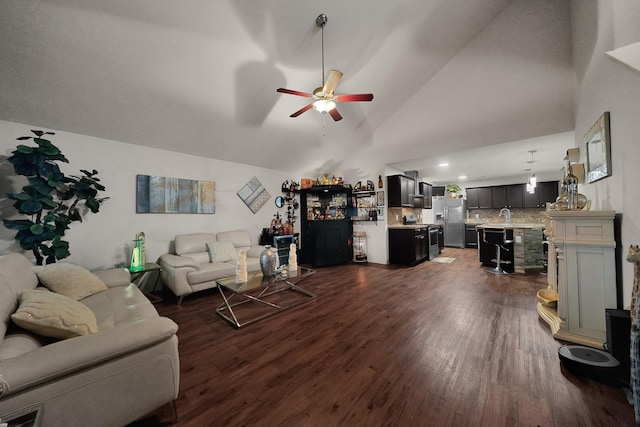 living room with dark hardwood / wood-style flooring, high vaulted ceiling, and ceiling fan