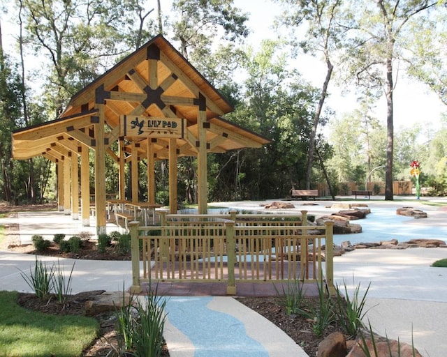 539 Oakview Bend Dr, Montgomery, TX 77316 - view of property's community with a gazebo and view of wooded area