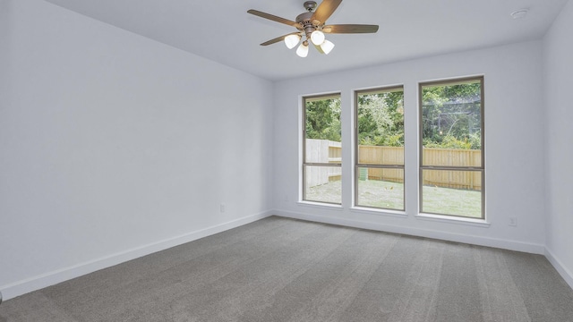 539 Oakview Bend Dr, Montgomery, TX 77316 - empty room featuring baseboards, carpet flooring, and a ceiling fan