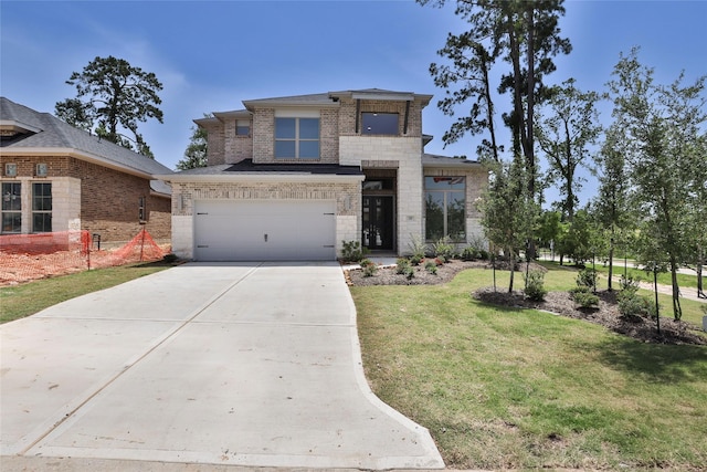 539 Oakview Bend Dr, Montgomery, TX 77316 - view of front of property with driveway, a front yard, a garage, and brick siding