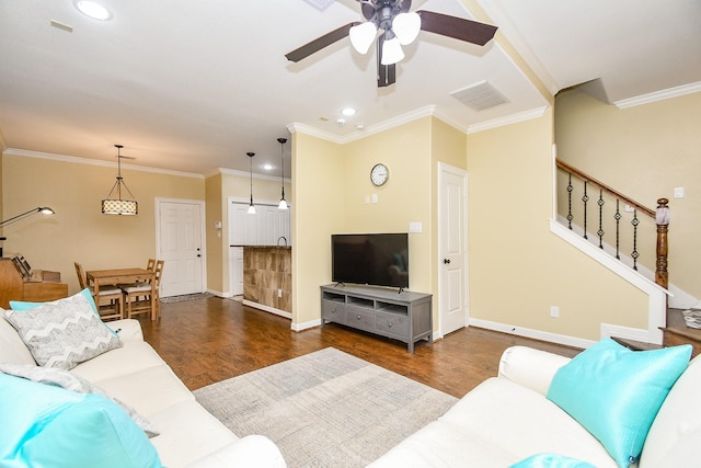 living room featuring crown molding, ceiling fan, and dark hardwood / wood-style flooring