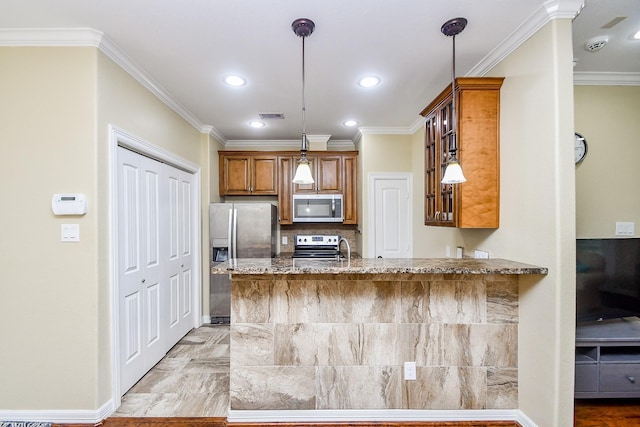 kitchen featuring dark stone counters, hanging light fixtures, ornamental molding, kitchen peninsula, and stainless steel appliances