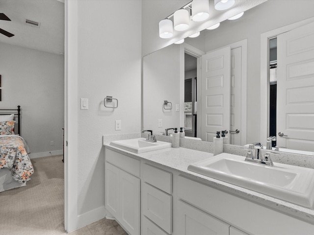 bathroom with vanity and ceiling fan