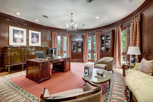 office space featuring crown molding and a chandelier