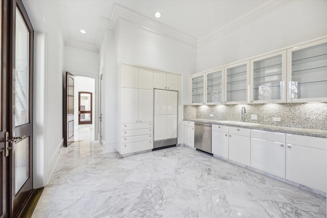 kitchen with sink, white cabinetry, crown molding, stainless steel dishwasher, and backsplash