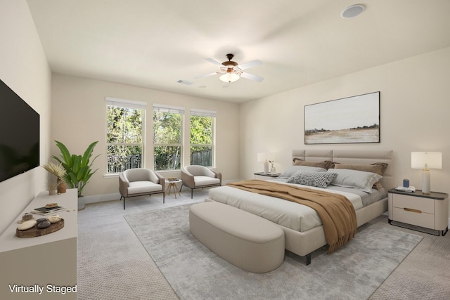 carpeted bedroom featuring ceiling fan