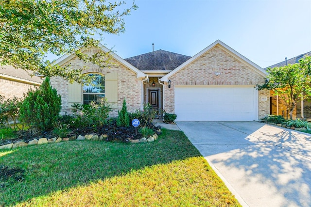 ranch-style house with a garage and a front lawn