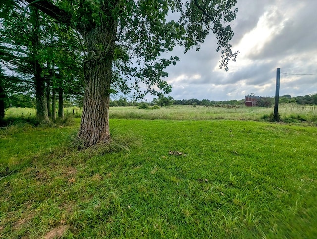 1946 County Road 109, Devers, TX 77538 - view of yard featuring a rural view