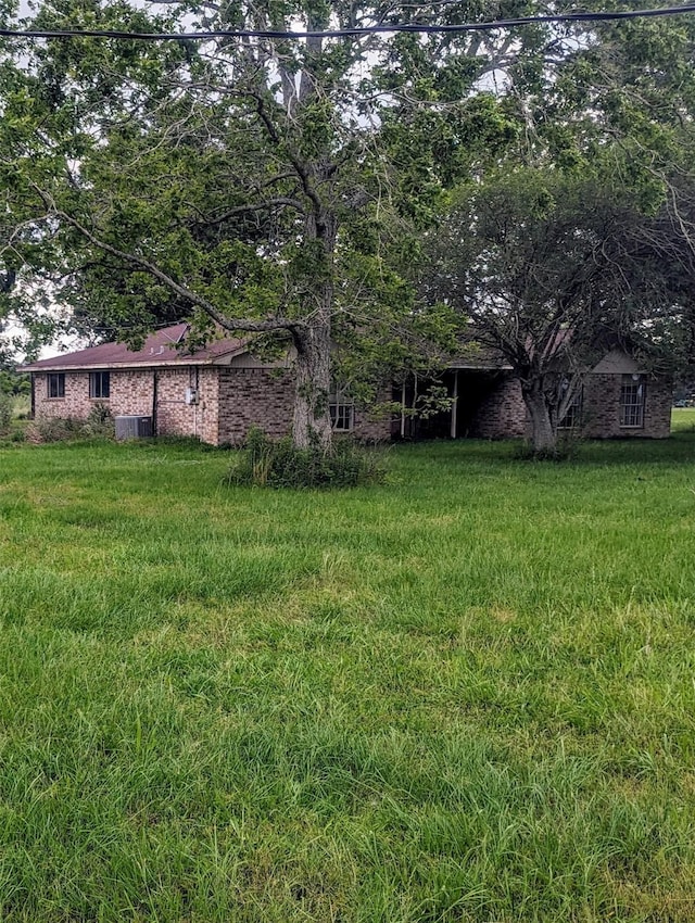 1946 County Road 109, Devers, TX 77538 - view of yard