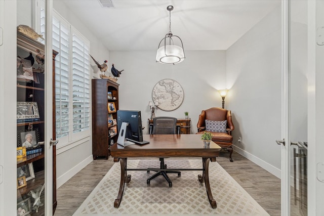 home office featuring wood-type flooring