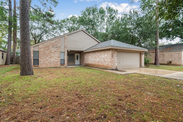 single story home featuring a garage and a front yard