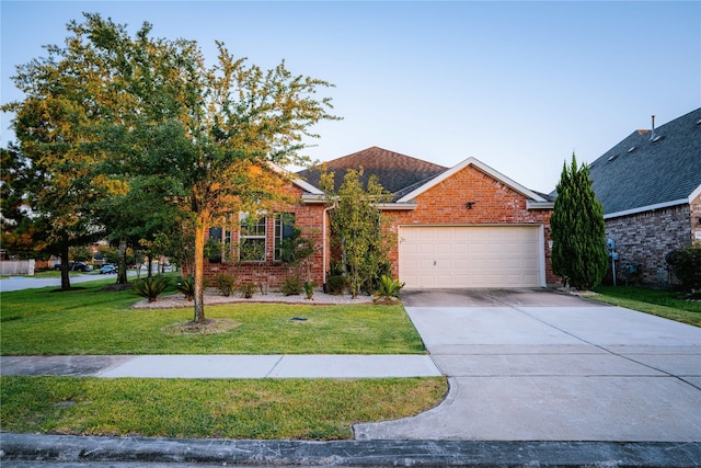 view of front of house with a garage and a front yard