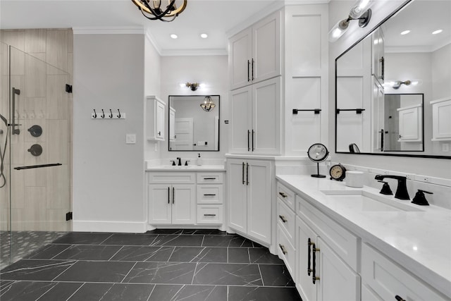 bathroom with a shower with door, crown molding, and vanity