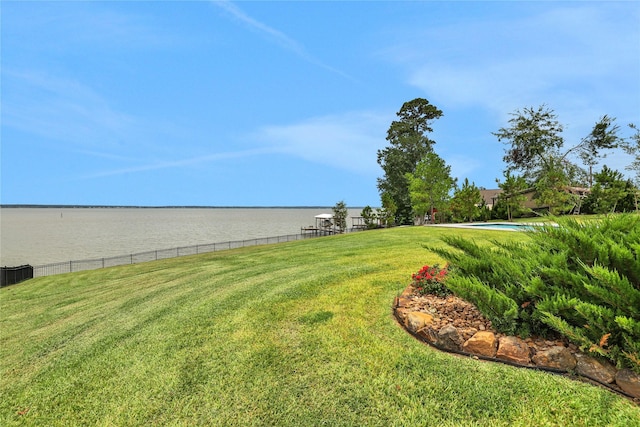 view of yard with a water view