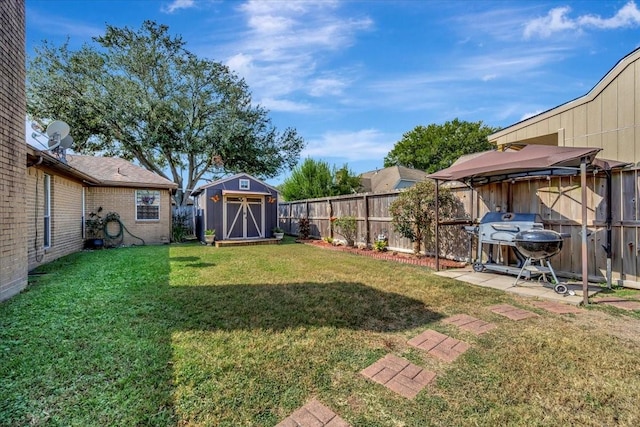 view of yard with a shed and a gazebo