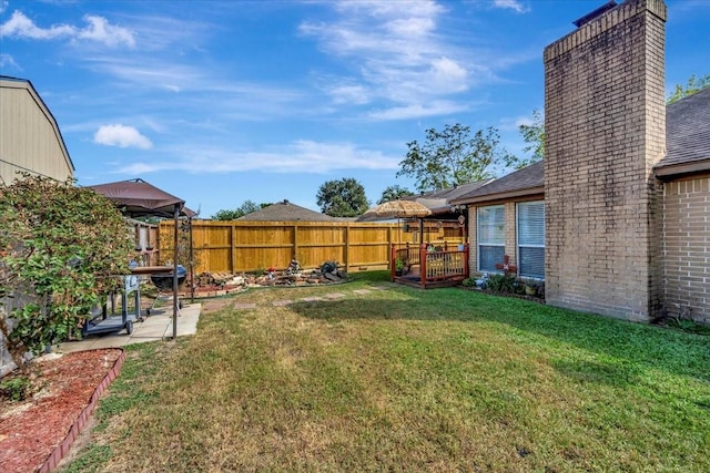 view of yard with a gazebo and a patio