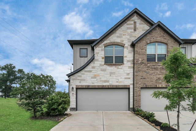 french country inspired facade featuring a garage