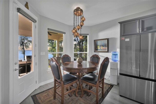 dining space featuring dark hardwood / wood-style floors