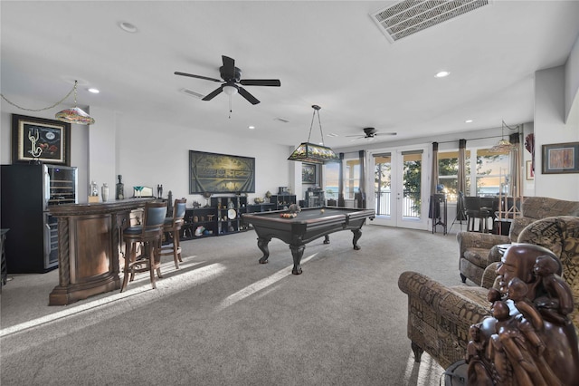 playroom with visible vents, carpet, a dry bar, recessed lighting, and french doors