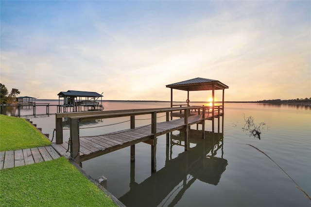 view of dock with a water view