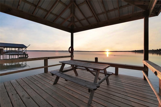 dock area featuring a gazebo and a water view