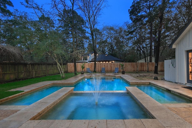 view of pool with an in ground hot tub