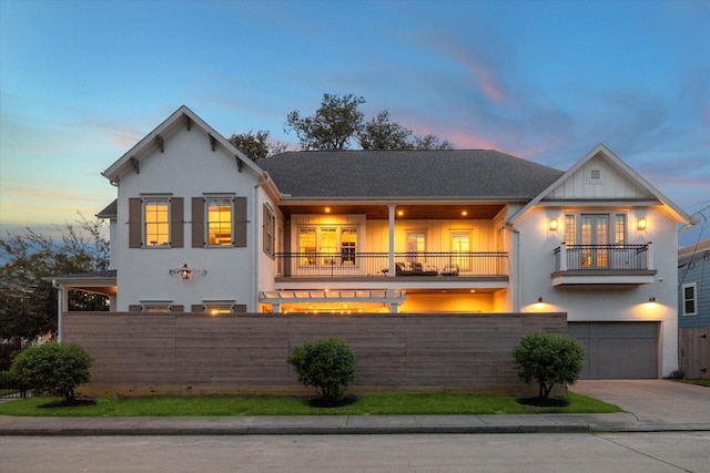 view of front of property with a balcony