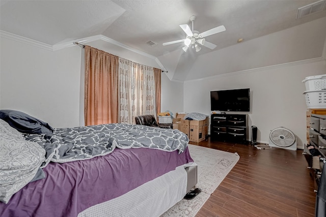 bedroom featuring crown molding, ceiling fan, lofted ceiling, and dark hardwood / wood-style floors