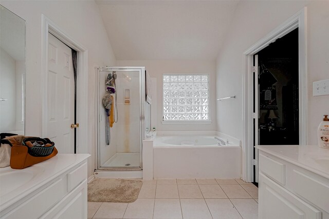 bathroom featuring vanity, separate shower and tub, and tile patterned flooring