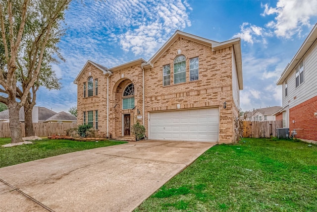 front of property with a garage, central air condition unit, and a front lawn