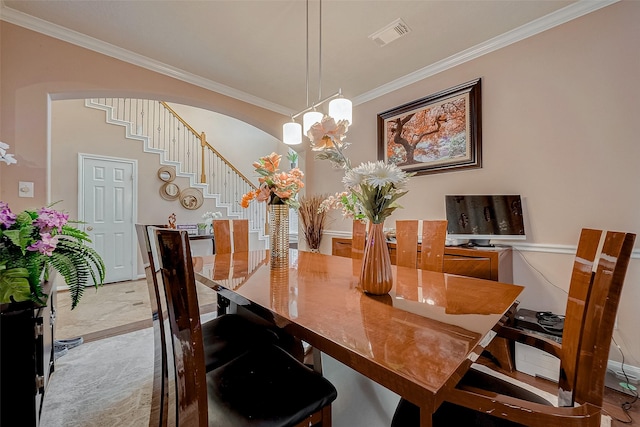 dining room with ornamental molding