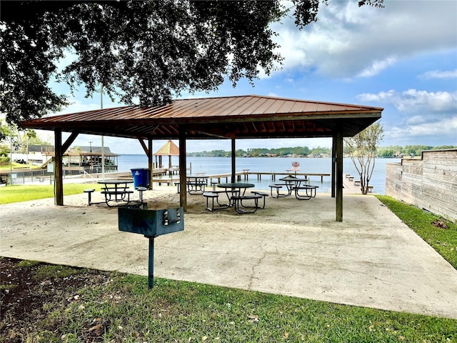 view of community featuring a gazebo and a water view