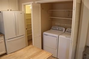 laundry room featuring laundry area and separate washer and dryer