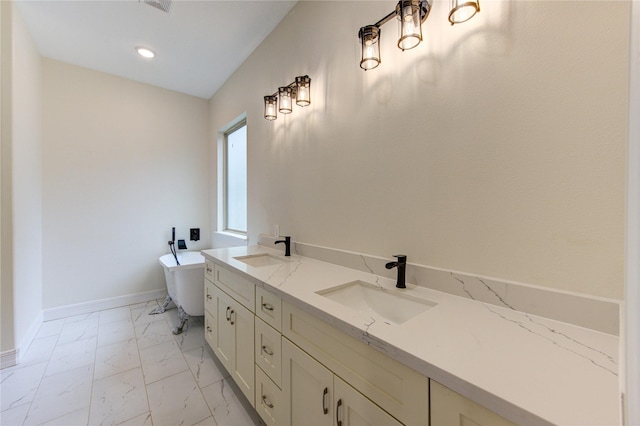 bathroom featuring vanity and a bathing tub