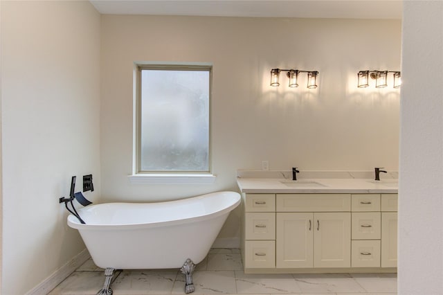 bathroom featuring vanity and a tub to relax in