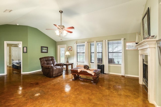 living area with lofted ceiling and ceiling fan