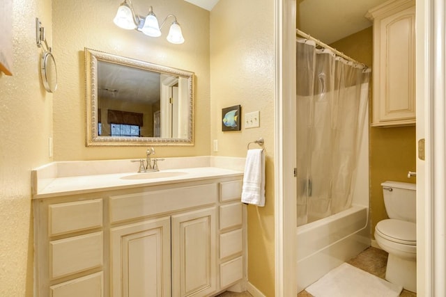 full bathroom featuring shower / bath combo, vanity, tile patterned floors, and toilet