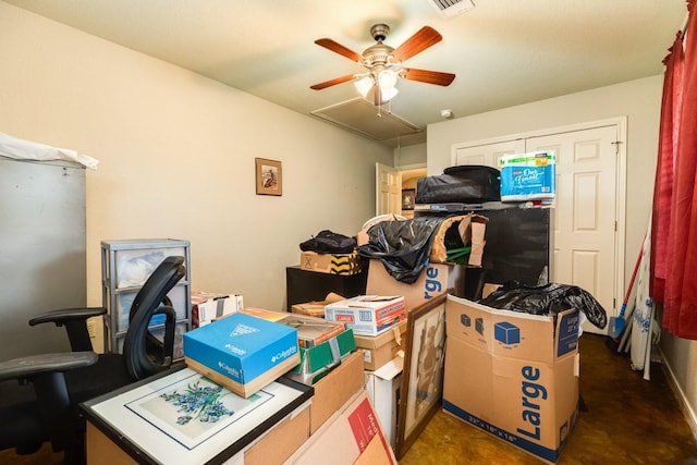 storage area featuring ceiling fan