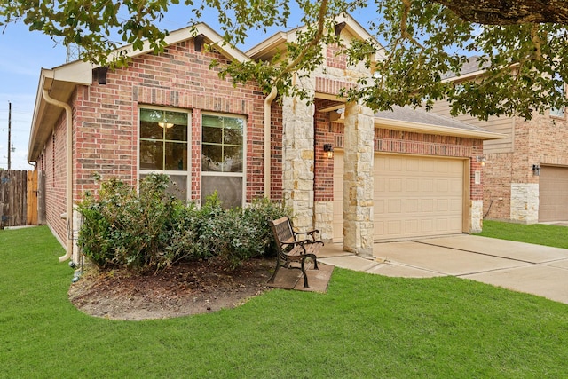 view of front facade with a garage and a front lawn