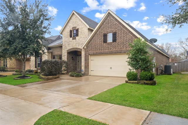 view of front facade featuring a garage and a front lawn