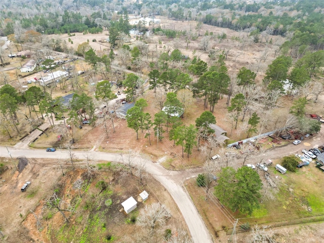 birds eye view of property with a rural view