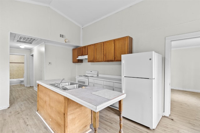 kitchen featuring tile countertops, sink, ornamental molding, white appliances, and light hardwood / wood-style flooring