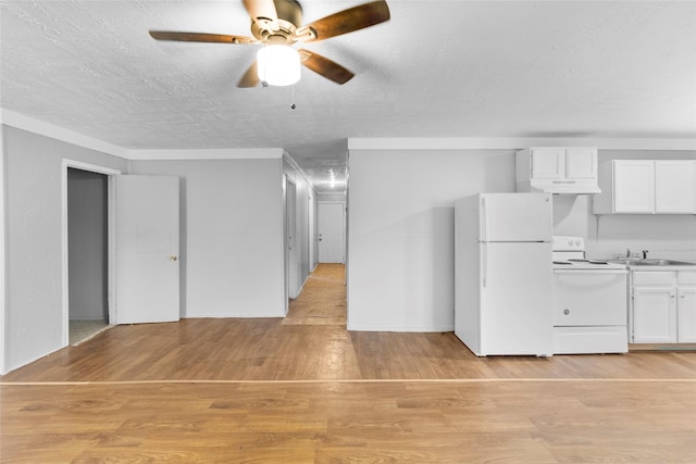 kitchen with white cabinetry, white appliances, a textured ceiling, and light wood-type flooring