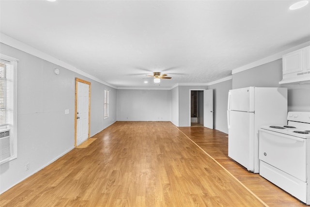 unfurnished living room featuring crown molding, light hardwood / wood-style flooring, and ceiling fan