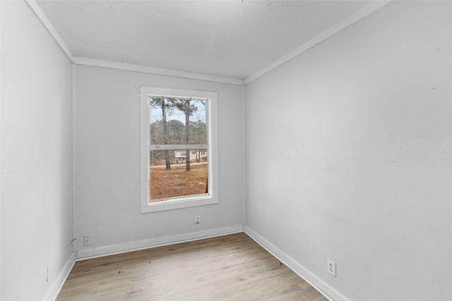 spare room with light hardwood / wood-style floors