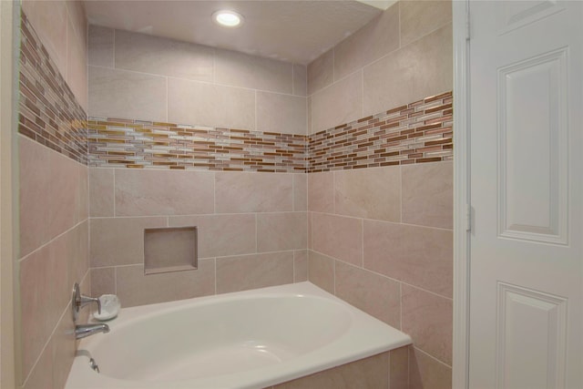 bathroom featuring  shower combination