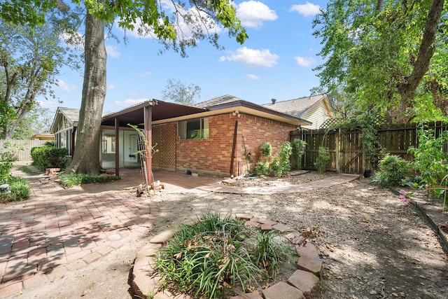 back of house featuring a patio