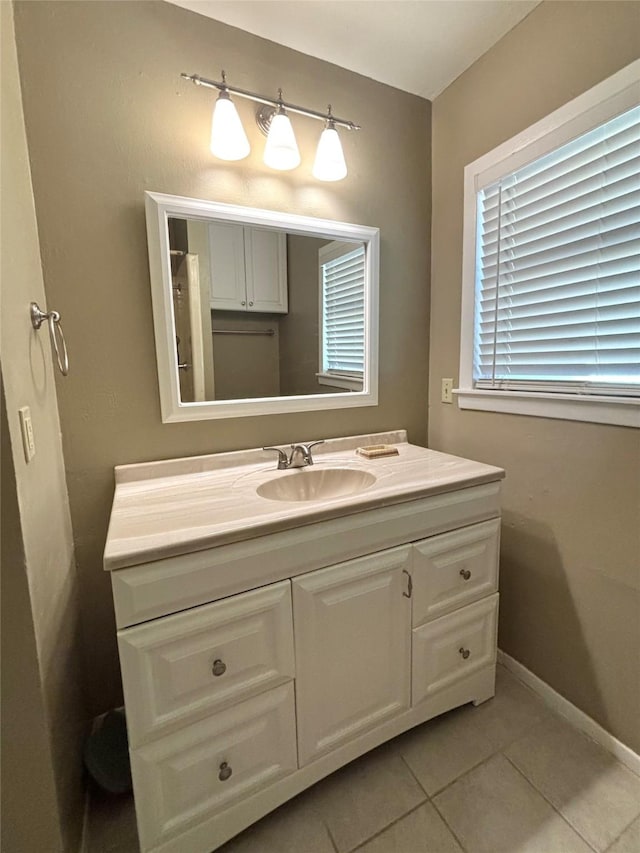 bathroom with vanity and tile patterned flooring