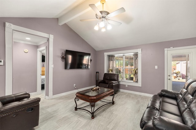 living room featuring lofted ceiling, a wealth of natural light, ceiling fan, and light hardwood / wood-style floors